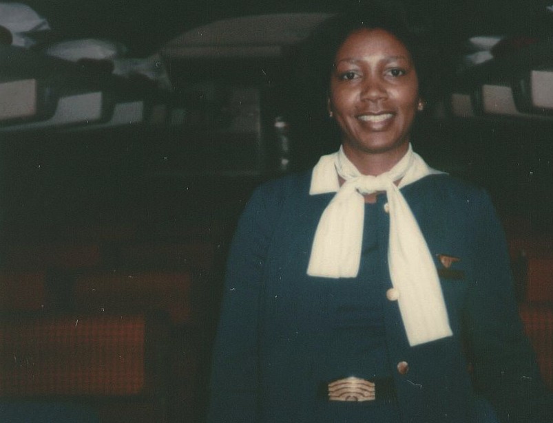 1979, January, Pan Am flight attendant Barbara Griffiths in the aisle of Boeing 707 tail number  N401PA Clipper Dauntless at Washington DC Dulles Airport.